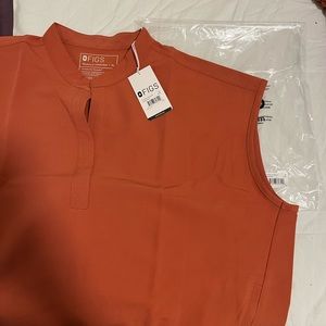 Brand new- never worn figs scrubs. XL top and XXL petite bottom.
